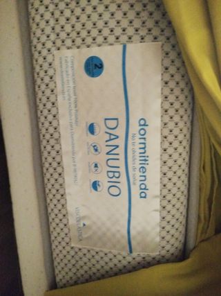 Somier tapizado con colchón 135cm