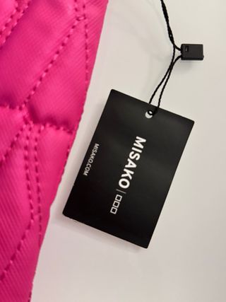 Bolso mano fucsia acolchado