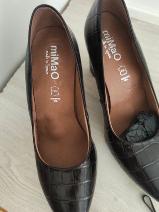 Tacones miMao negros piel serpiente