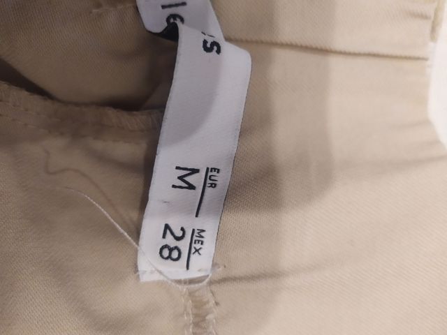 Pantalón pinzas beige