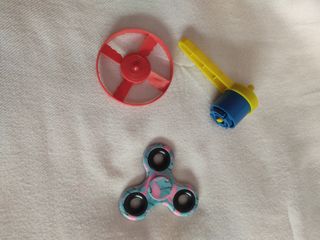 Juguete volador y spinner