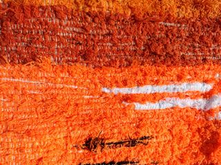 Alfombra jarapa boho marrón y naranja