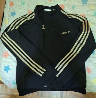 Chaqueta Adidas mujer negra y dorada