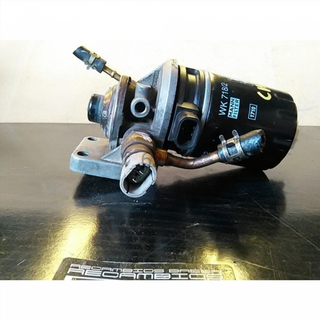 Soporte filtro gasoil Mitsubishi Carisma H