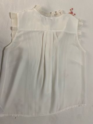 Blusa blanca plisada