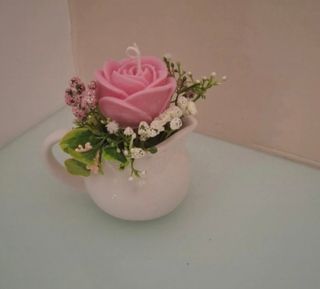 Teiera con rosa di cera di soia