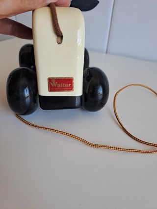 Vaca de madera juguete antiguo