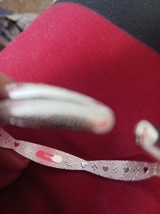 Pulsera plata 999 ley. Cruzada.