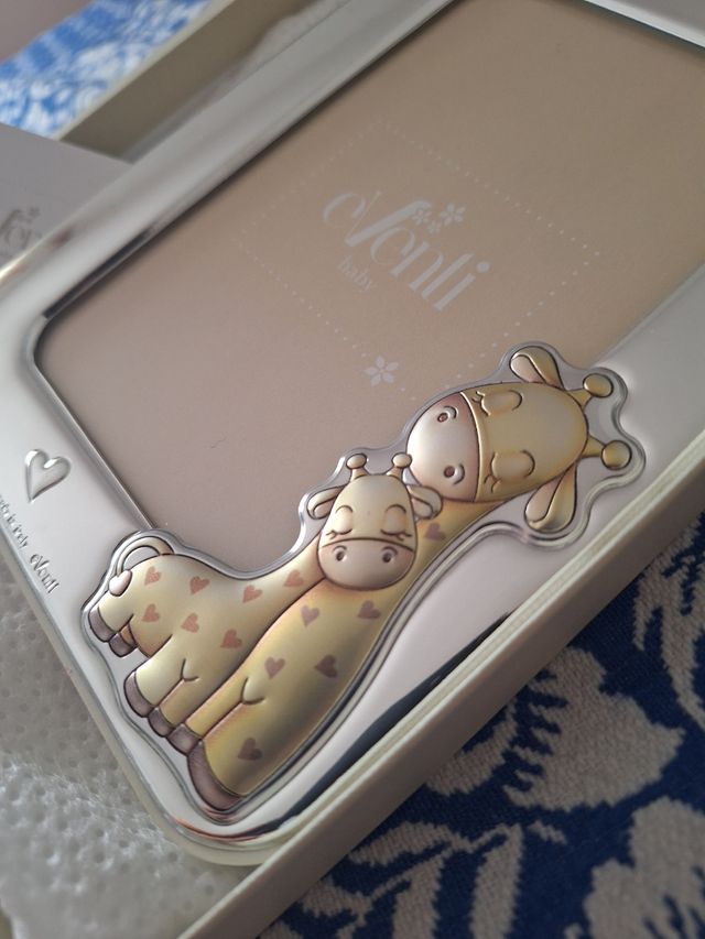 Marco fotos bebé jirafa plata