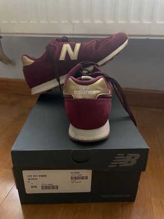 Zapatillas New Balance 373 granates y doradas