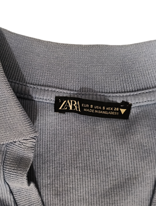 Top polo corto manga larga azul Zara