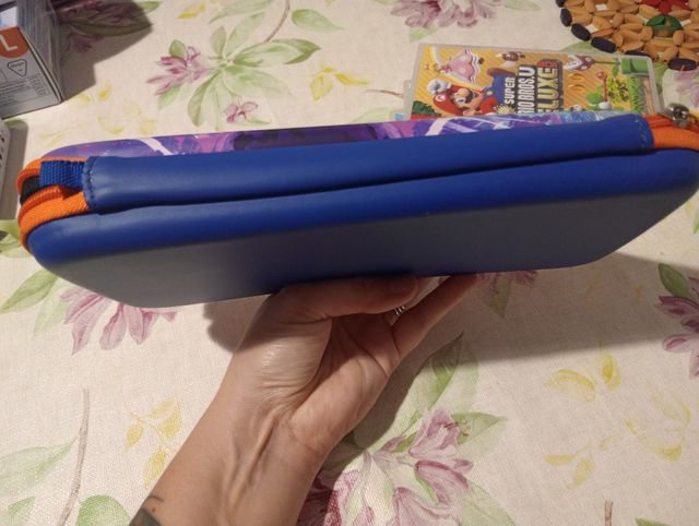 Nintendo Switch Lite Pink + cover + giochi