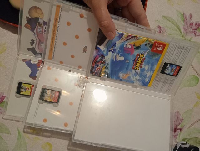 Nintendo Switch Lite Pink + cover + giochi