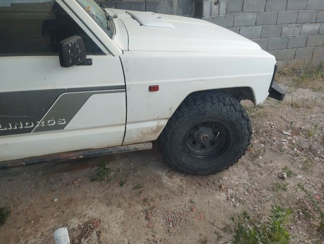 Neumáticos 33 + llantas nissan