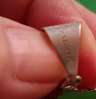 Colgante vintage Colgate plata