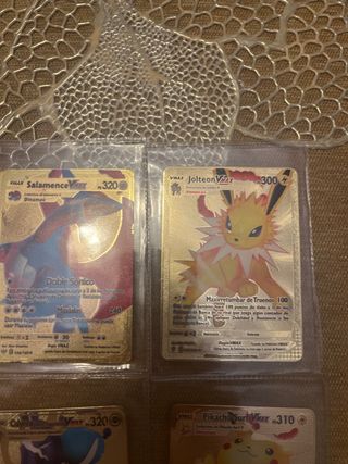 4 cartas Pokémon vmax oro
