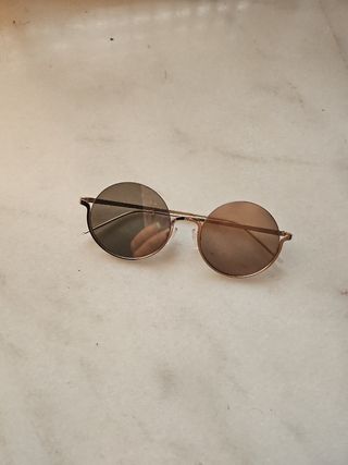 Gafas sol redondas doradas
