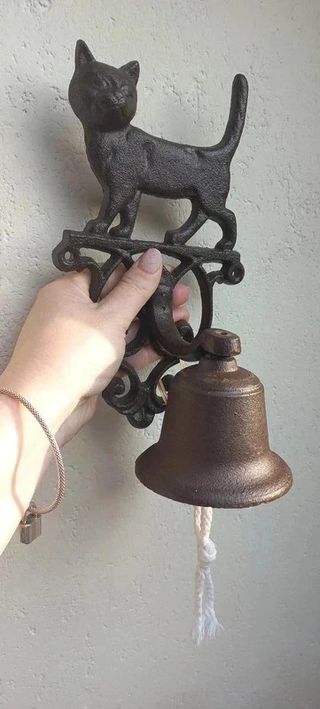 Campana da parete con gatto. Nuova