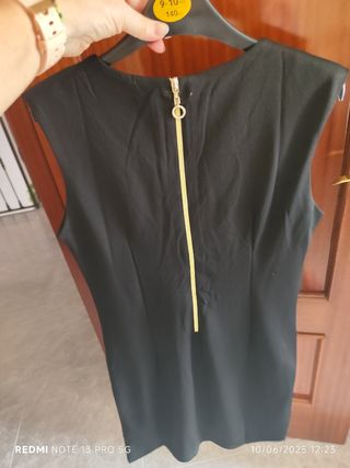 Vestido negro y dorado talla M.con torerilla de en