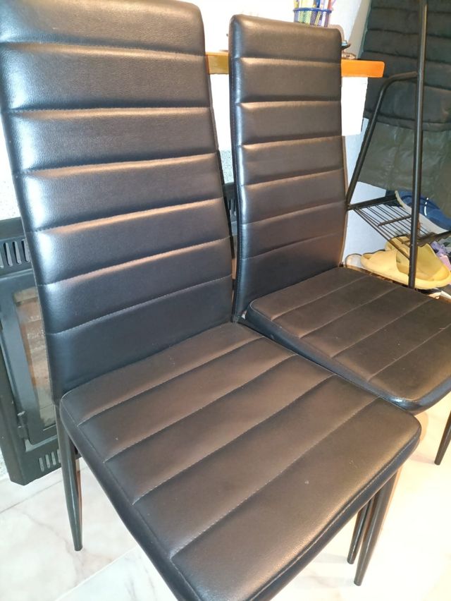 Mesa cristal 4 sillas negra