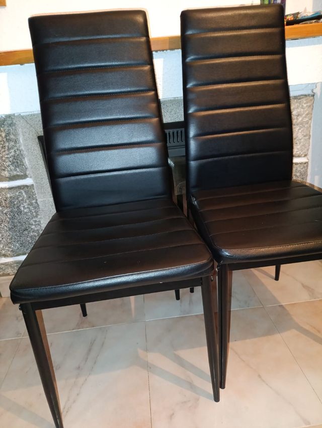 Mesa cristal 4 sillas negra