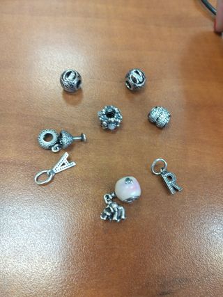 7 Charms Pandora Plata Rosa 15€ unidad