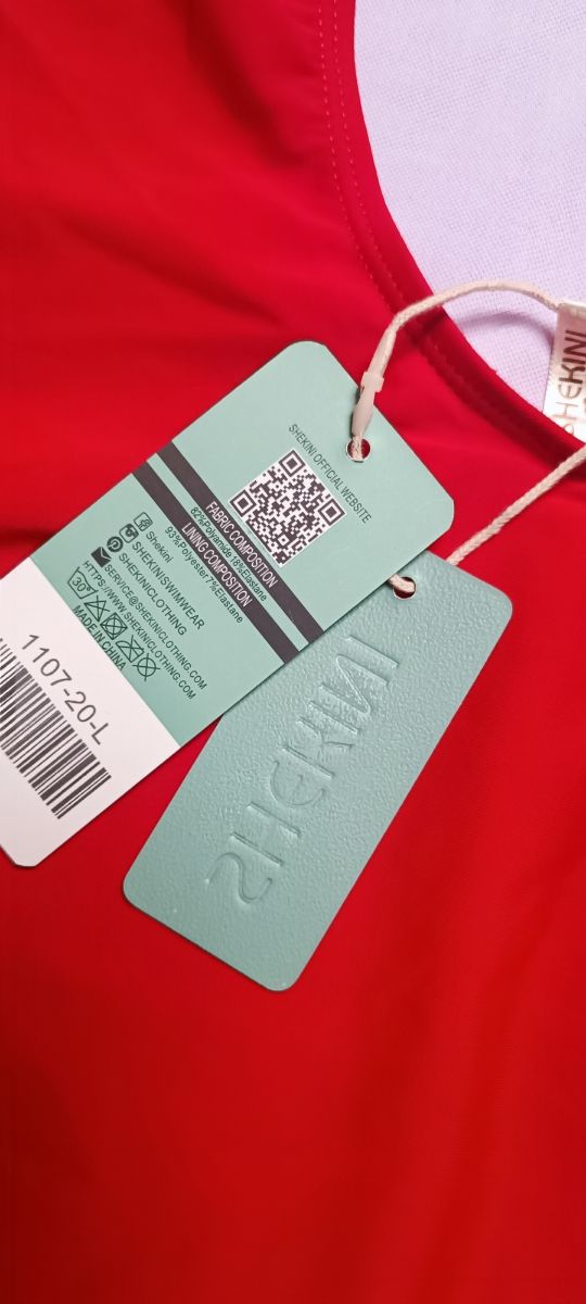 Costume intero rosso nuovo con cartellino