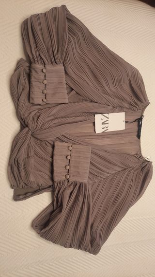Blusa plisada Zara malva