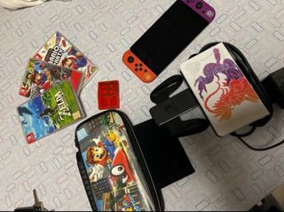 Nintendo Switch OLED EDICION ESCARLATA Y PURPURA