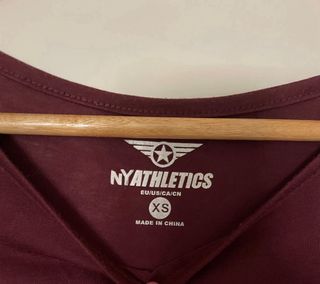 Camiseta  deporte morada nudo