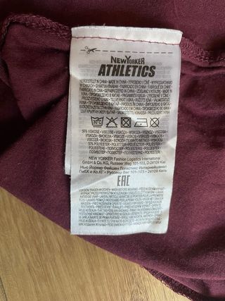 Camiseta  deporte morada nudo