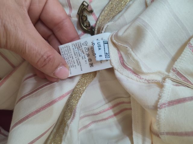 Pantaloni a zampa beige e rosa