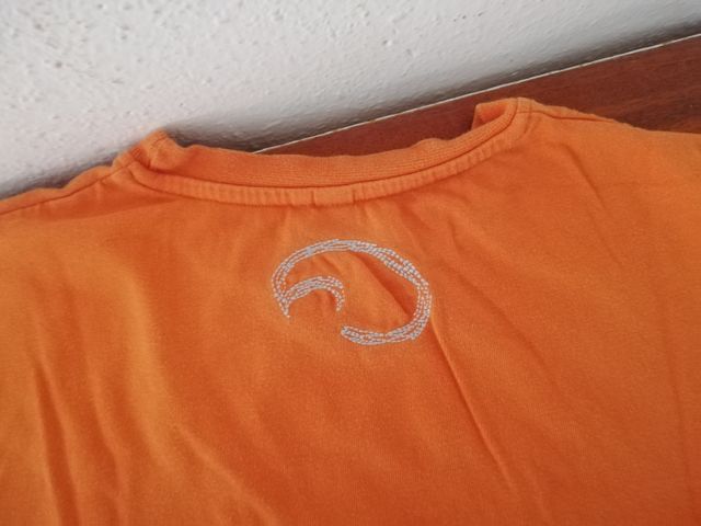 Camiseta surf naranja niño