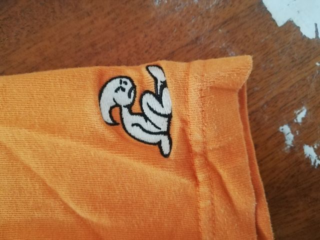 Camiseta surf naranja niño