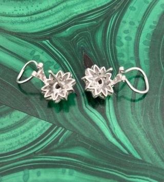 Pendientes tipo roseron con diamantes y Tasacion. 