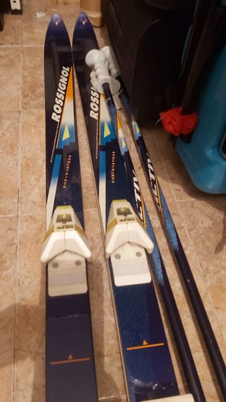 Esquís Rossignol + Bastones