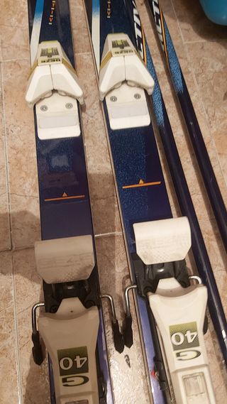 Esquís Rossignol + Bastones