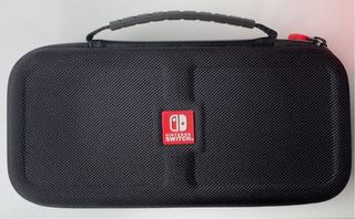 Nintendo Switch Gris + 2 Juegos + mando + 2 fundas