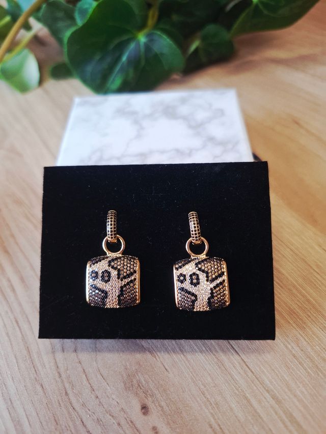 Pendientes leopardo dorados
