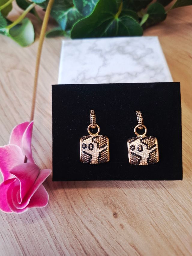 Pendientes leopardo dorados
