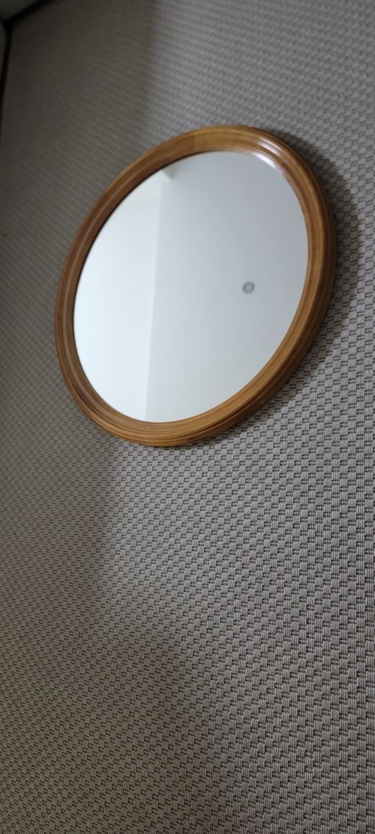 Espejo ovalado madera castaño.
