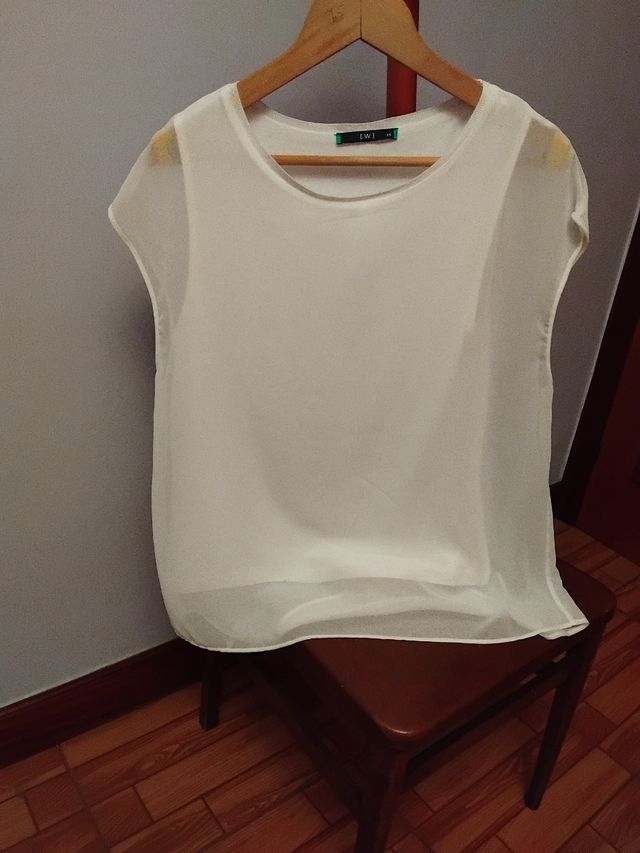 Blusa blanca sin mangas