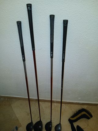 41 bolas golf usadas y 4 palos de golf