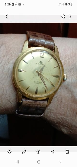 Reloj Bucherer 22 microns oro funciona cuerda