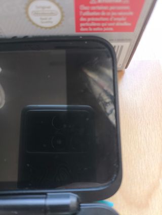 Nintendo 2DS XL negra.