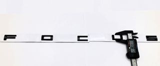 EMBLEMA LOGO TRASERO NEGRO FOCUS de FORD