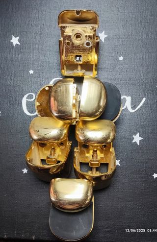 0233 Soportes estantería dorados - 6uds