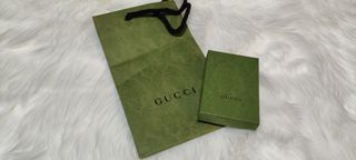 Caja y bolsa Gucci 