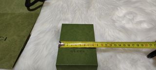 Caja y bolsa Gucci 