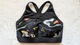 Top deportivo negro estampado (talla M)